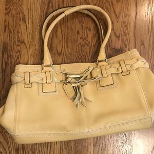 COACH pebble leather satchel.